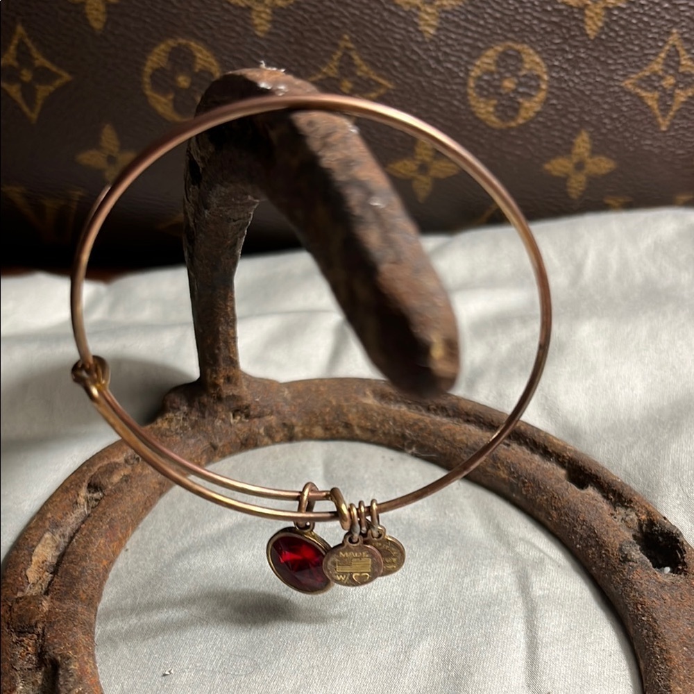 Gold Bangle Bracelet with Red Charm